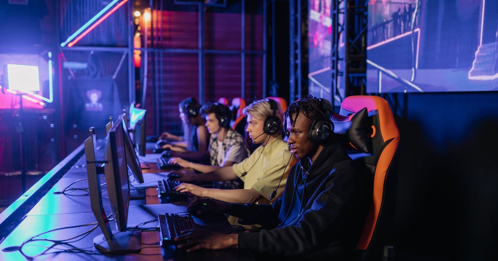 People gaming together at an esports setup