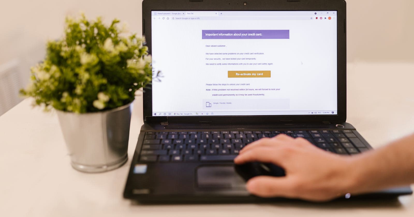 Person reading an email on a laptop