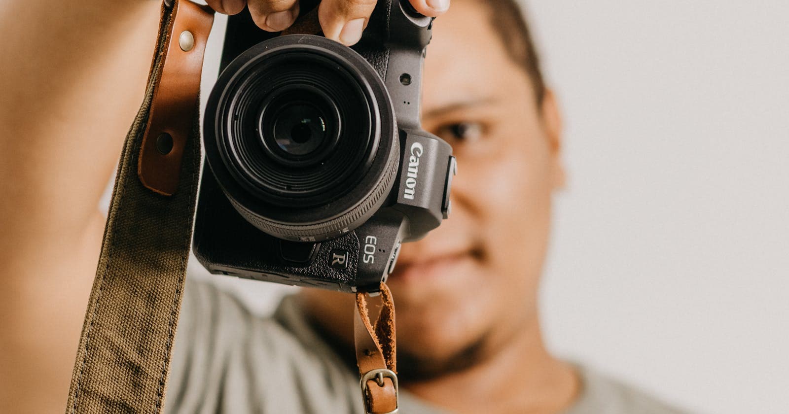 Photographer holding a camera