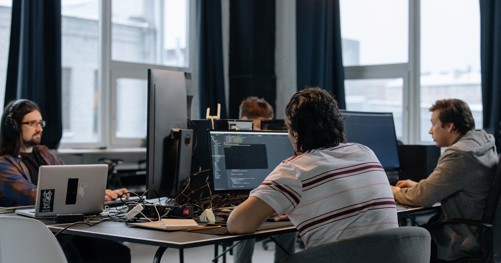 Startup team working at computers in a modern office