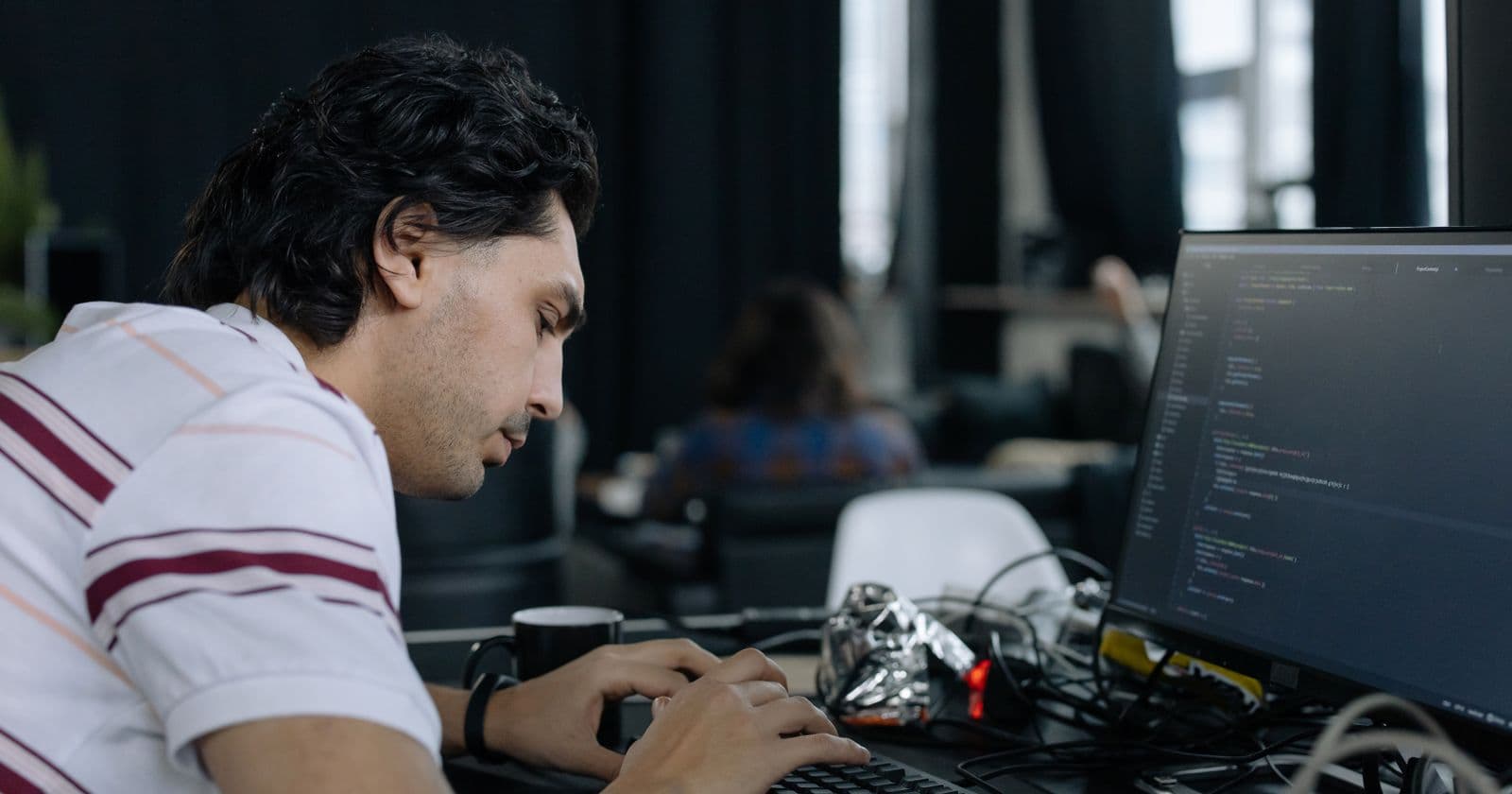 Developer coding at a desk