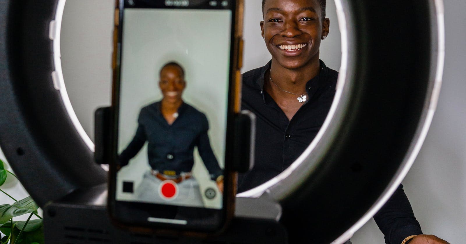 Creator recording with a phone and ring light